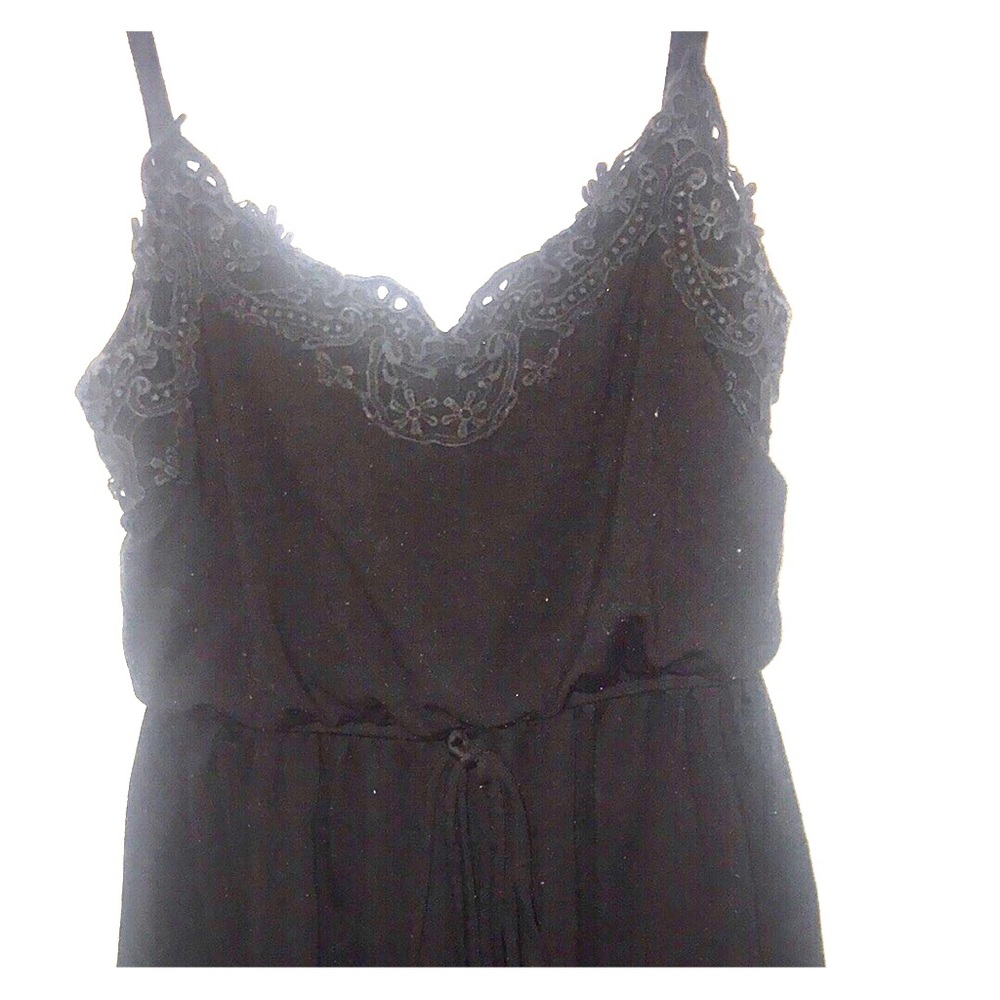 Short black dress with lace detail